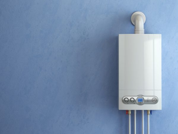 Gas boiler on blue background. Gas boiler home heating.